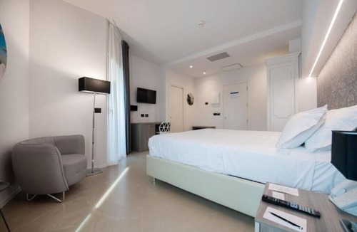 Aci Trezza Hotel | Elegant Bedroom w/Panoramic Balcony by the Sicilian Coastline