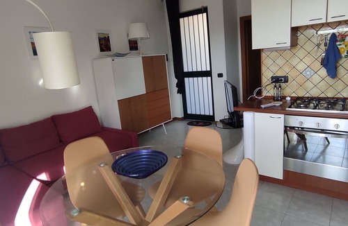 Costa Saracena-Castelluccio Apartment | La Rose sur la Mer Bivani with panoramic views of the Gulf of Catania and Etna.