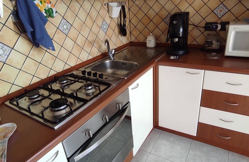 Costa Saracena-Castelluccio Apartment | La Rose sur la Mer Bivani with panoramic views of the Gulf of Catania and Etna.