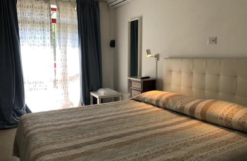 Montalto Uffugo House | le camere nel giardino dei cocomeri