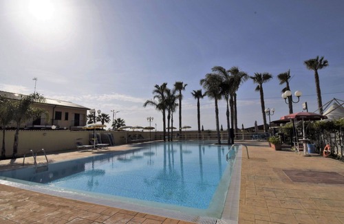 Porto Empedocle Apartment | Lovely apartment for 4 people with pool, A/C, WIFI, TV and balcony