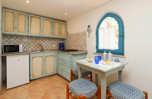 Trinita d'Agultu e Vignola Apartment | Lovely apartment for 3 guests with patio and pets allowed