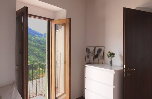 Sangineto Apartment | Lumiravista - Alto: Maisonette with Panoramic Views in Historic Sangineto
