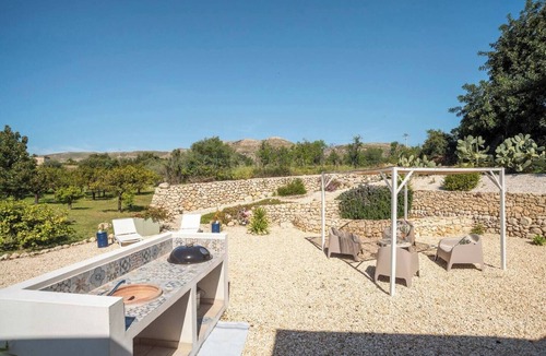 Avola Villa | Mediterranean-style villa surrounded by centuries-old olive and lemon trees