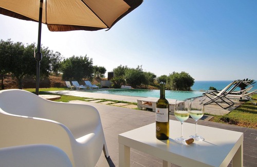 Campofelice di Roccella Villa | Modern property with Private Golf Practice, Private Pool, Garden, WiFi, Sea VIew