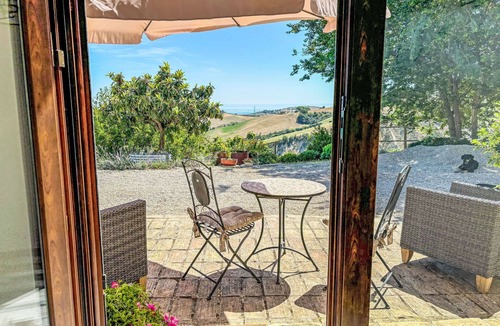 Cologna Spiaggia Villa | Nice apartment in villa with hot tub, pool, A/C, WIFI, TV, patio, pets allowed, panoramic view