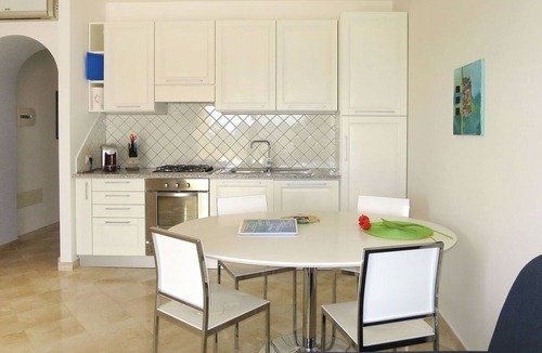Porto Pozzo Apartment | Nice apartment for 4 guests with WIFI, A/C, pool, TV, terrace and pets allowed