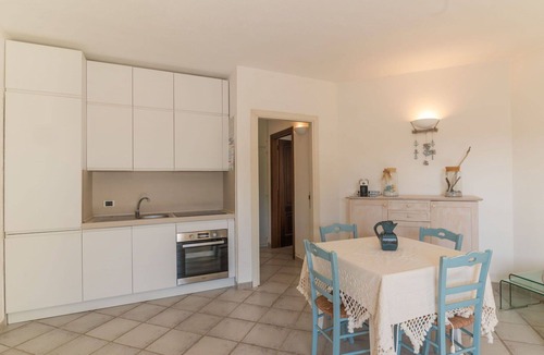 Baia Caddinas Apartment | Nice apartment for 4 guests with pool, WIFI, A/C, TV, terrace and pets allowed