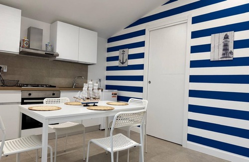 Palmi House | Palms by the sea - within walking distance of the beach.