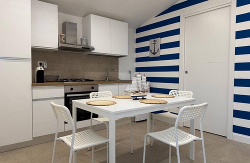 Palmi House | Palms by the sea - within walking distance of the beach.