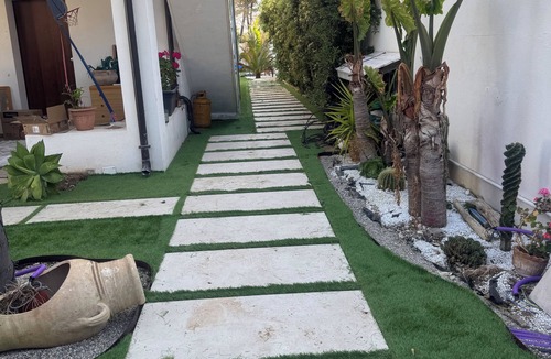 Palmi House | Palms by the sea - within walking distance of the beach.
