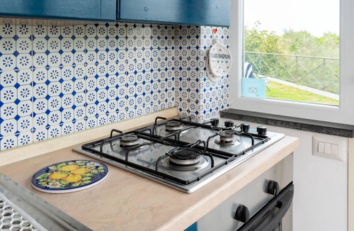 San Pietro House | Panoramic apartment with garden and private parking