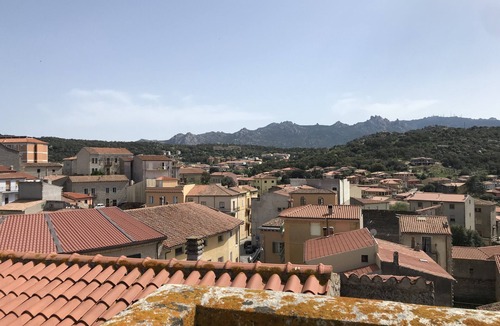 Calangianus Apartment | Quadruple Room with Balcony Overlooking the Main Street and Square, Air Conditioning