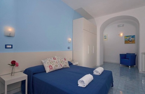 Forio Bed & Breakfast | Room with terrace and a wonderful view of the Bay of Citara