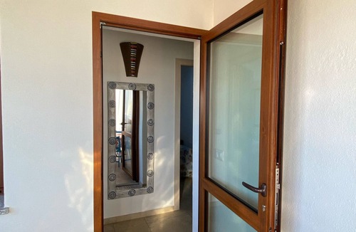 Porto Pozzo Villa | Sea view apartment with patio 250 meters from the sea ideal for families or 2 couples