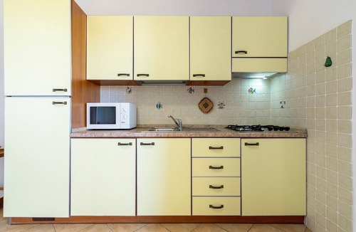Paduledda House | Sea View Isola Rossa Apartment with Sea View, Wi-Fi, and Air Conditioning