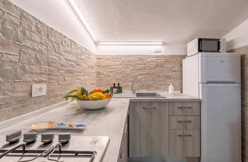 Agnone Bagni Apartment | Seaside Apartment 'Trifamiliare Garden - Conchiglia' with Private Terrace, Wi-Fi & AC