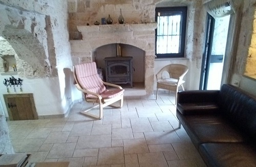 San Michele Salentino Villa | Secluded Trulli, huge patio, extra large pool, wood pizza oven and barbeque area