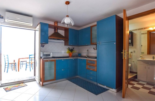 Sant'Agata di Militello Apartment | Tasteful top floor apartment with great roof terrace with beautiful sea view.