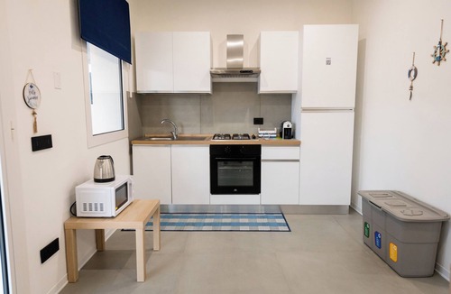Scoglitti Apartment | The pool and Sicilian sunsets along the coast of Scoglitti.