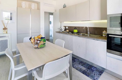 Reitani Villa | Three villas next to each other, sea front with private pools