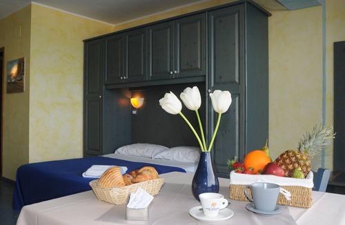 Province of Messina House | Vacation Home "Oasi Azzurra - Monolocale Standard 2" with Shared Pool & Shared Terrace