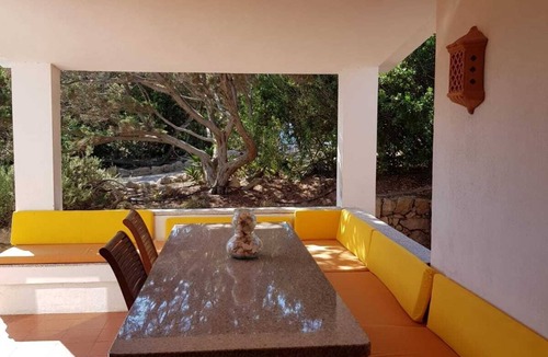 Portobello di Gallura Villa | Villa a short walk from the sea surrounded by a garden with trees, plants and flowers