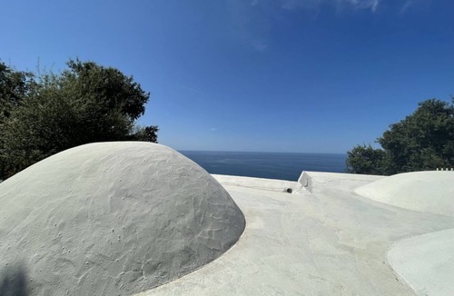 Caronia Villa | Villa Alice is an independent newly built villa, designed in the traditional “dammuso” style with its characteristic dome and overlooking the sea. It is a retreat immersed in nature, perfect for those seeking peace, privacy and an authentic stay. The