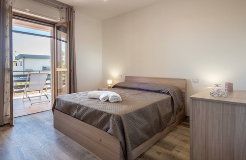 Torre Colonna-sperone Villa | Villa 'Carola Primo Piano' with Shared Pool, Wi-Fi and Air Conditioning