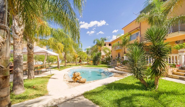 A spacious apartment with a bathing area in the garden awaits you.