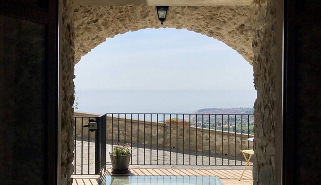 An historic luxury apartment with panoramic views over the Ionic coast and sea