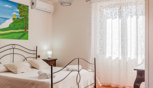 Apartment 'Quadrone Torre Salsa' with Sea View, Shared Terrace and Air Conditioning