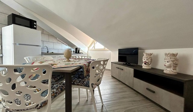 Attic room is unique and cozy in the center of the village.