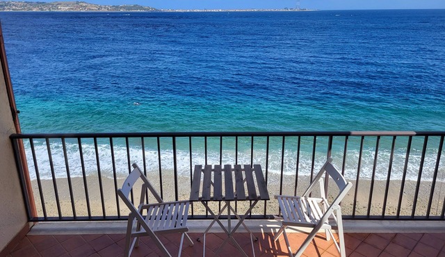 Beach house over the sand with an amazing view of Sicily
