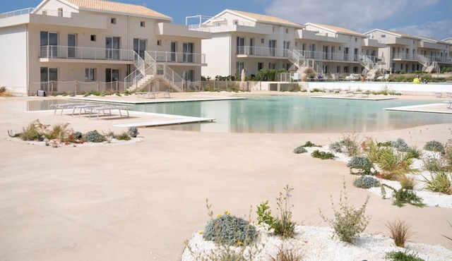 Charming two-level apartment, accommodating up to 5 people, located within the renowned Borgo 84 residence, featuring two swimming pools and a bike path. The property is located just 3 km from the center of Marzamemi, one of the most fascinating seaside