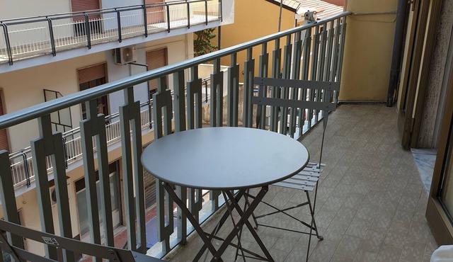 Comfortable one-bedroom apartment with kitchen and terraced balcony with mountain view