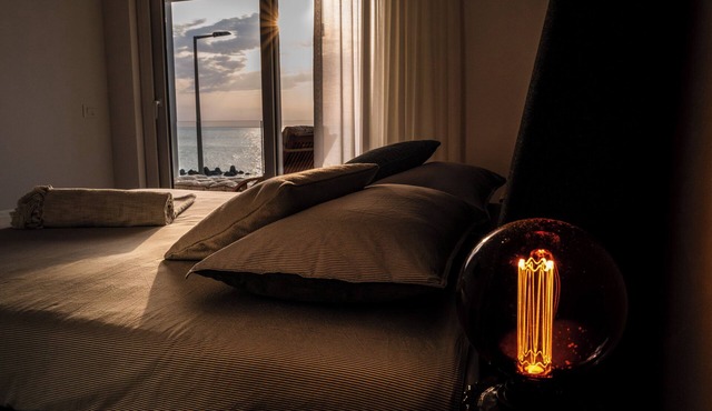 Exclusive apartment with sea view, two bedrooms and private parking space
