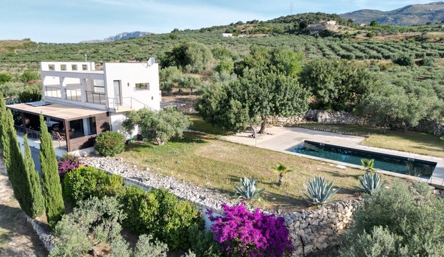 Exclusive villa with private pool in secluded location surrounded by Sicilian olive groves