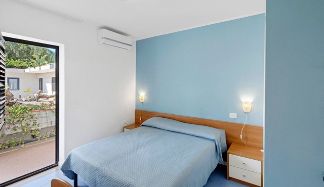 Marina Living Rooms – Economy Double Room with Shared Pool, Wi-Fi & Air Conditioning