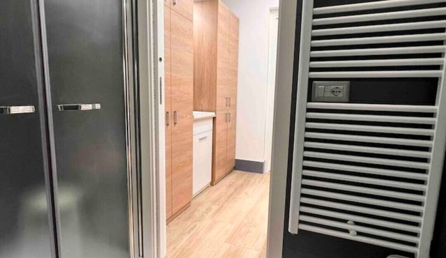 Modern oasis. 1 minute walk to the beach. A/C