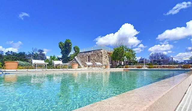 Modern stone villa with pool and sea view
