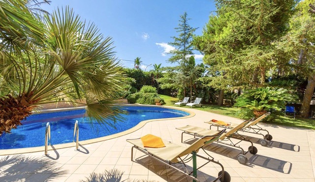 My Rental Homes - Villa Acquamarina with swimming pool surrounded by greenery