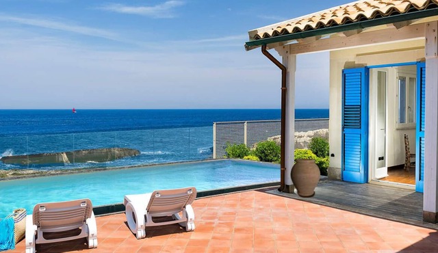 Private seafront villa with swimming pool