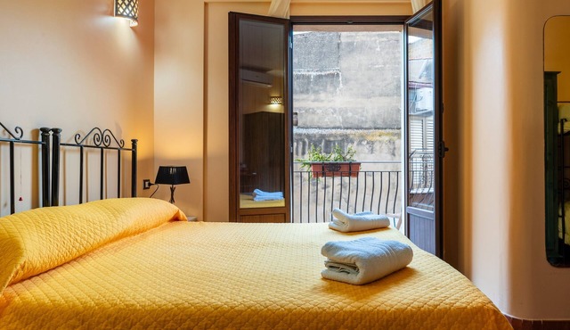 Room 'B&B San Domenico - Superior Quadruple' with Balcony, Wi-Fi and Air Conditioning