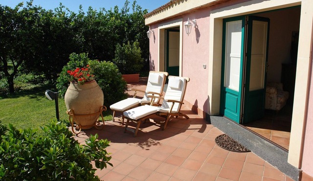 Tasteful house with private terrace enclosed by a scented garden with sea view