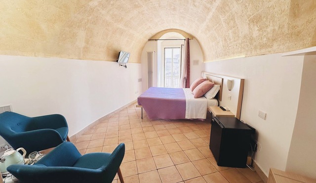 The Smile of the Sassi Rooms. Idris Superior Deluxe on Sassi view.