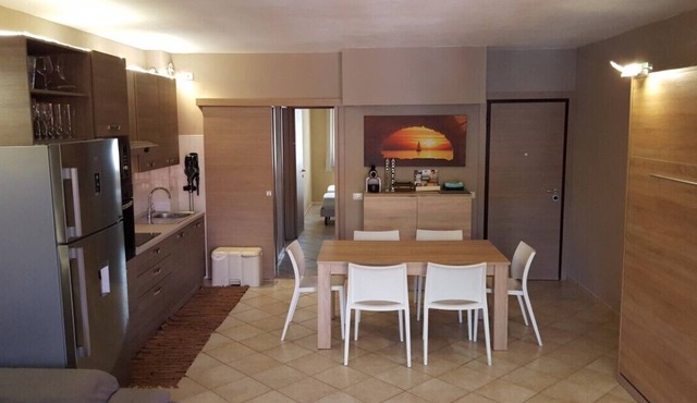 three-room apartment with 2 bathrooms, large terrace and equipped garden.
