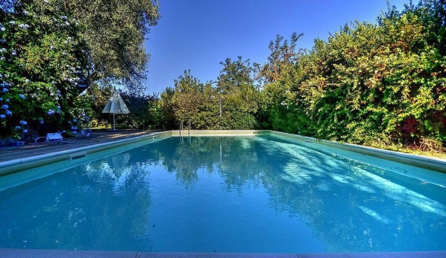 Villa Calesse A: A characteristic and welcoming independent house surrounded by meadows and by green hills, with Free WI-FI.