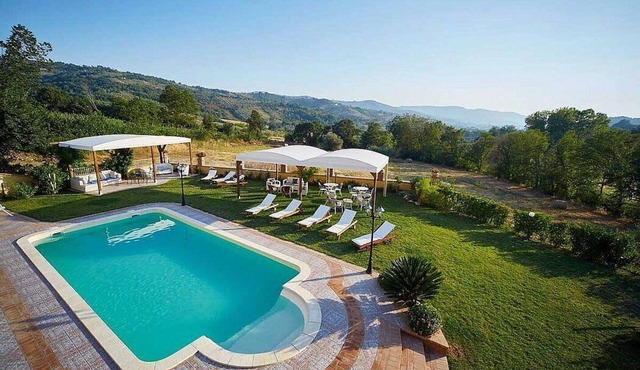 Villa Giuncalia Grande: A welcoming two-story age-old farm house surrounded by the greenery, with Free WI-FI.