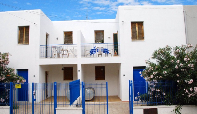 white villa near the center and beach of Porto Cesareo